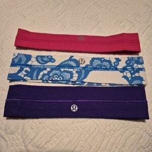 Lululemon 3 head bands guc red 1 has a mark